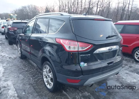 2016 Ford Escape Titanium z USA, uszkodzony, nr VIN 1FMCU9JX3GUC48727